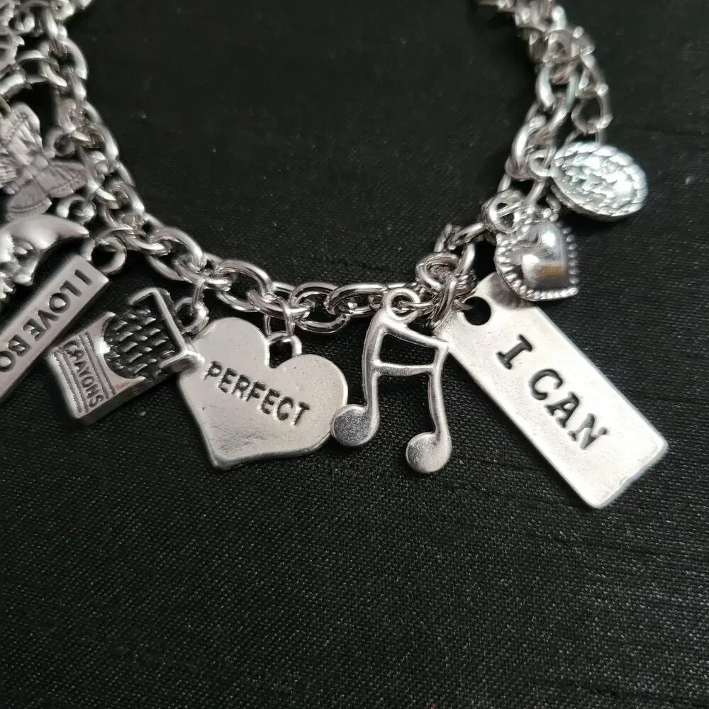 Teacher themed charm bracelet with books, coffee, crayons & inspirational charms